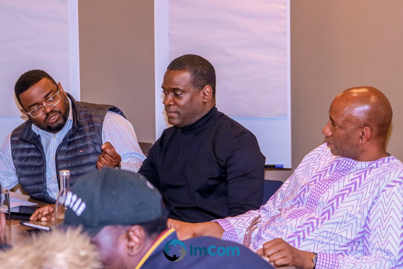 An attendee listening during the session