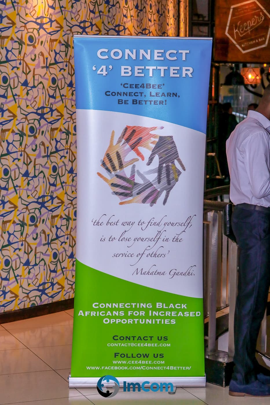 A Connect4Better banner in the venue before the doors opened