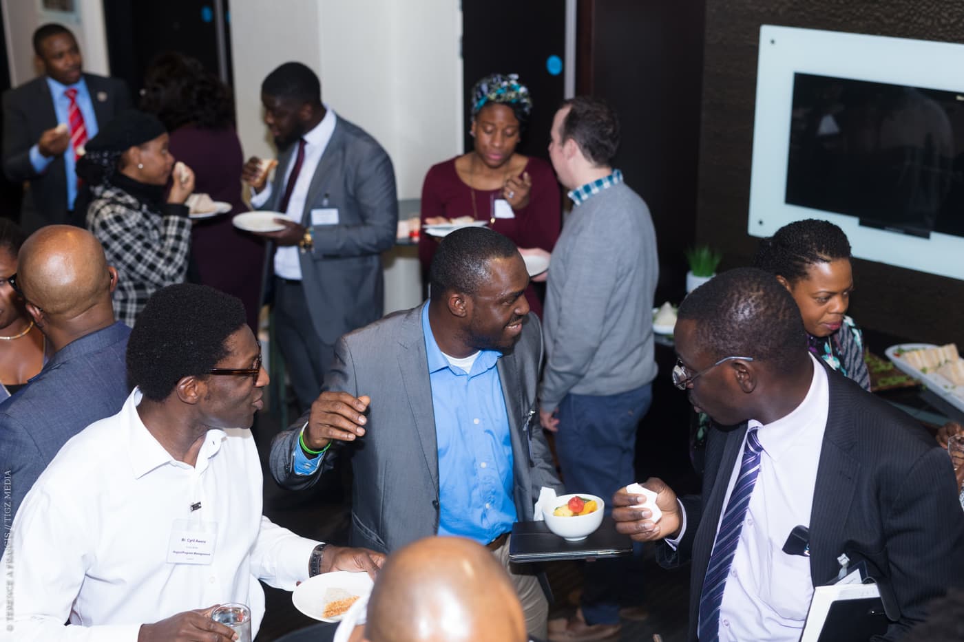 A group talking over food and drinks
