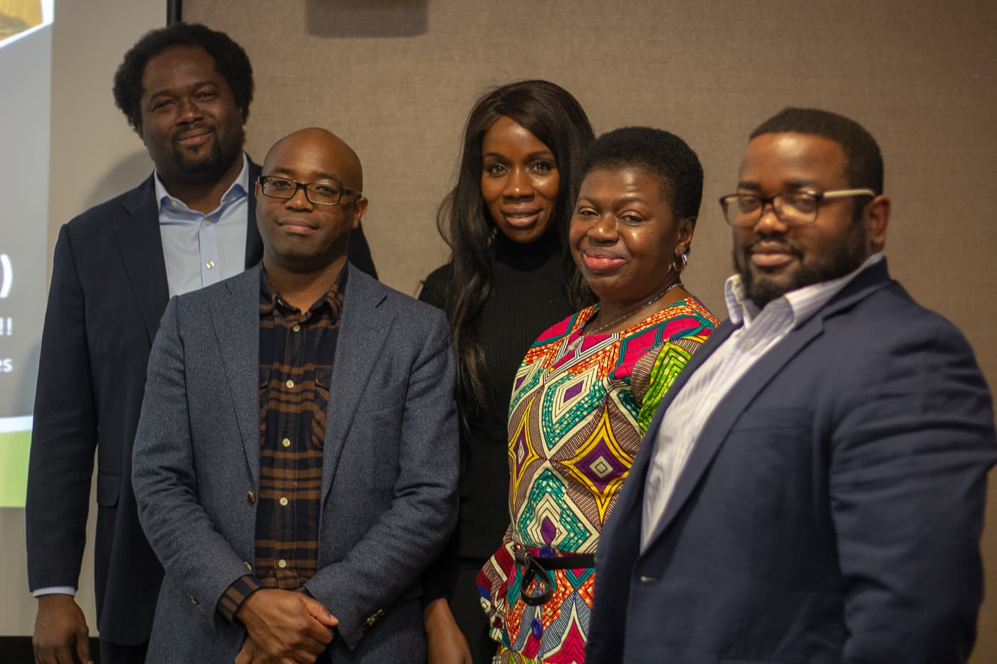 Four organisers and speakers together after the event