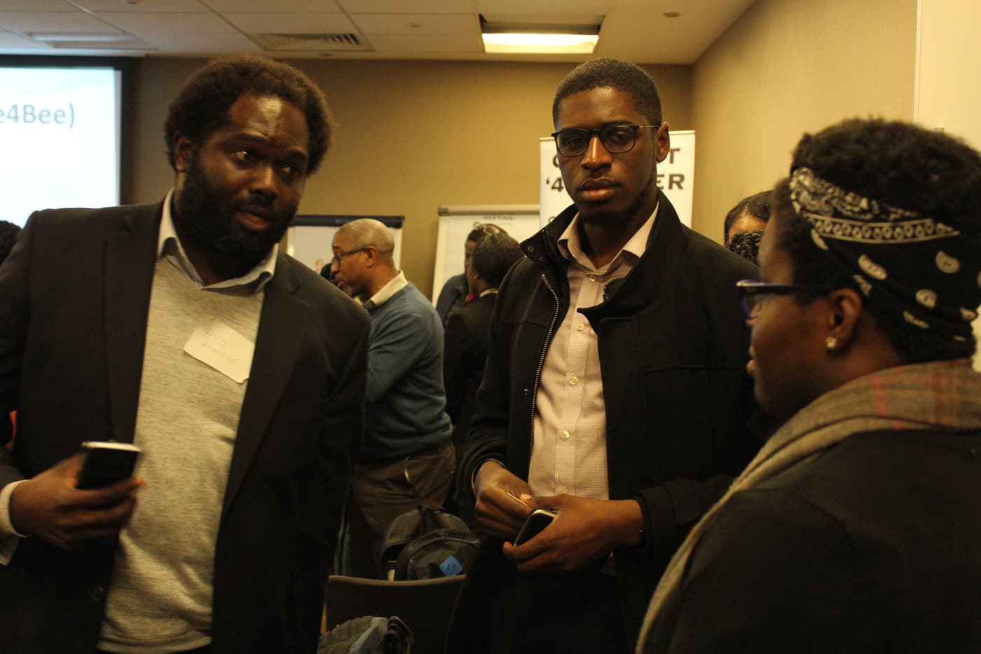 Two attendees deep in conversation