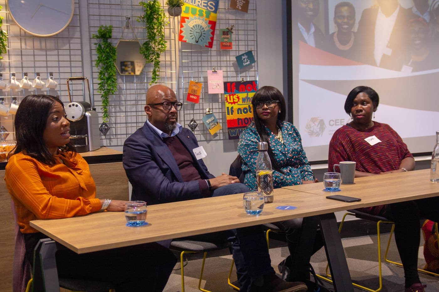 The panel seated along the table
