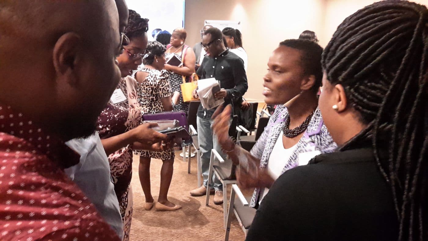 A group of attendees in conversation