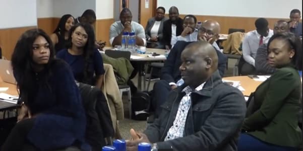 Attendees seated around tables at an early Cee4Bee workshop