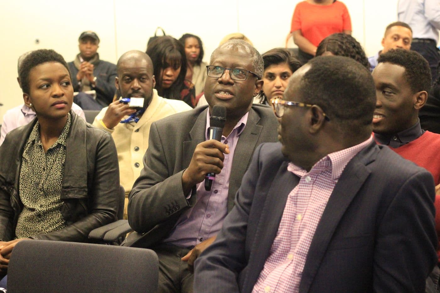 An attendee putting a question to the panel