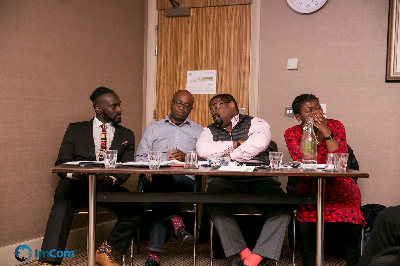 Four panellists at the table during the discussion