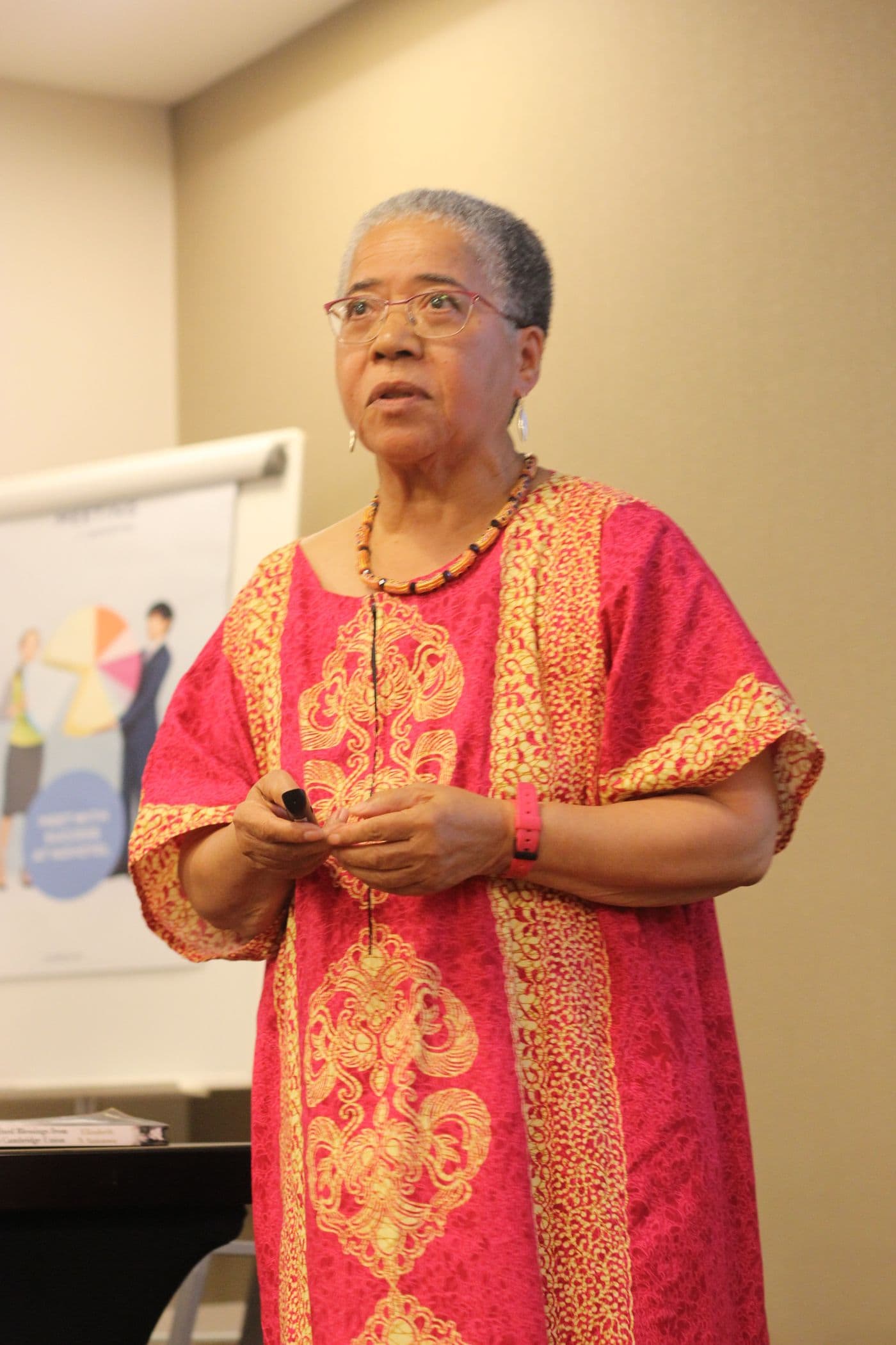 A speaker addressing the room